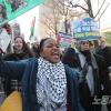 -1월 13일 오후 팔레스타인인들과 연대를 1.13 국제 행동의 날 집회를 마친 참가자들이 광화문 사거리와 명동을 지나 시청까지 행진을 하고 있다.