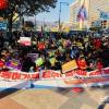 -12일 오후 이주노동자들이 서울 광화문 동화면세점 앞에서 ‘전국노동자대회 이주노동자 사전대회’를 열고 있다.