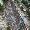 -경찰 방해를 뚫고 모인 민주노총 노동자 8000명이 7월 3일 오후 종로3가 인근 도로에서 전국노동자대회를 열고 있다.