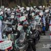 -12월 23일 서울 송파구 배달의민족 본사 인근에서 배민라이더 노동자들이 결의대회를 열고 기본배달료 인상 등을 요구하고 있다.