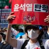 -5월 20일 오후 서울 프레스센터 앞 세종대로에서 열린 후쿠시마 오염수 투기 저지 대회에서 시민들이 방사능 오염수 해양투기 반대 구호를 외치고 있다