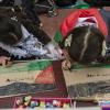 -2월 3일 오후 서울 주한 이스라엘 대사관 인근에서 열린 팔레스타인 연대 20차 집회에 참가한 어린이들이 직접 팻말을 만들고 있다.